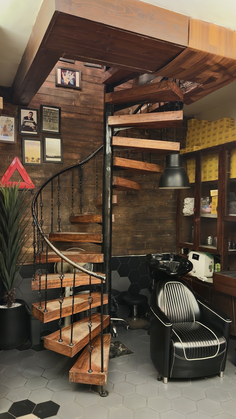 A spiral staircase with timber treads at the Zamzama branch